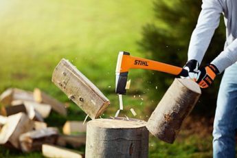 Store logs for the winter by chopping them with a STIHL cleaving axe