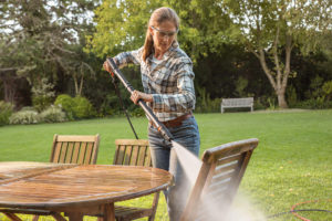 Use your RE 130 PLUS Pressure Washer to restore garden furniture