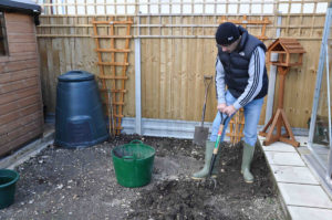 dig over the area whilst removing stones and debris
