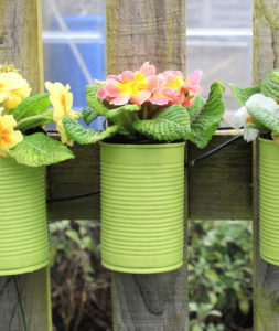 make your own tin plant pots to hang from your garden fence