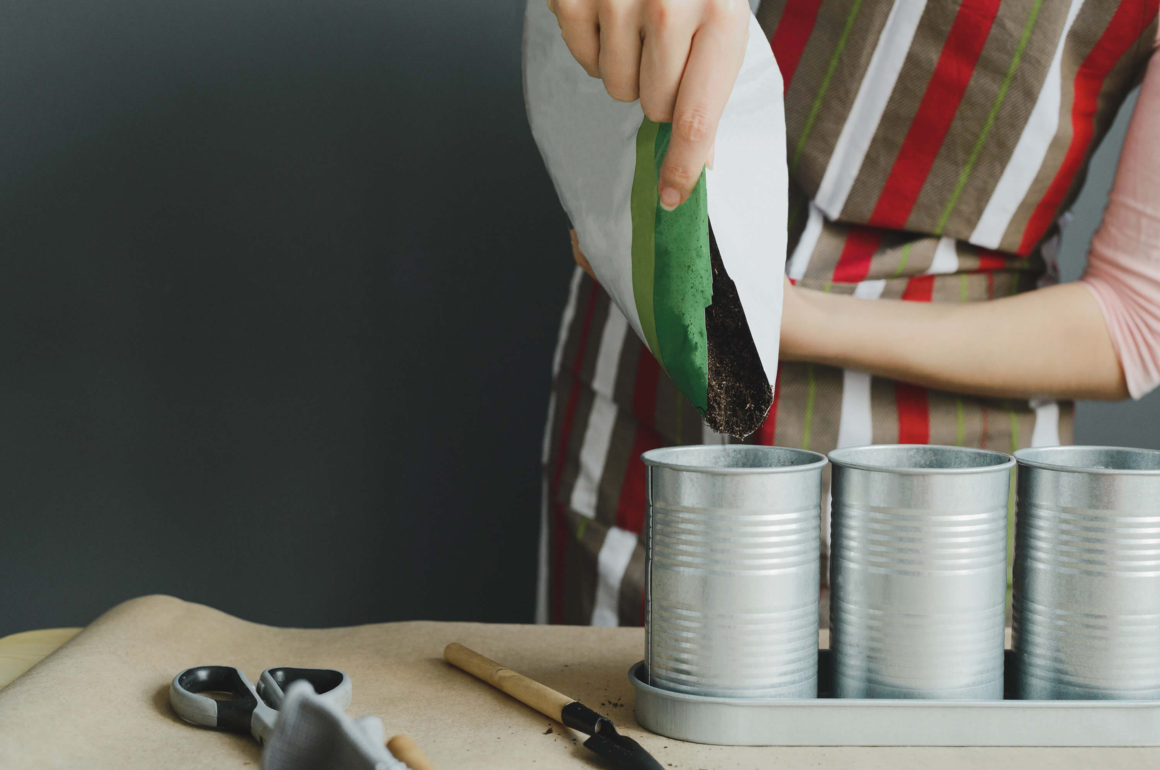 fill your tin plant pots with soil