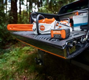 STIHL AP Battery ready to be used in a cordless chainsaw